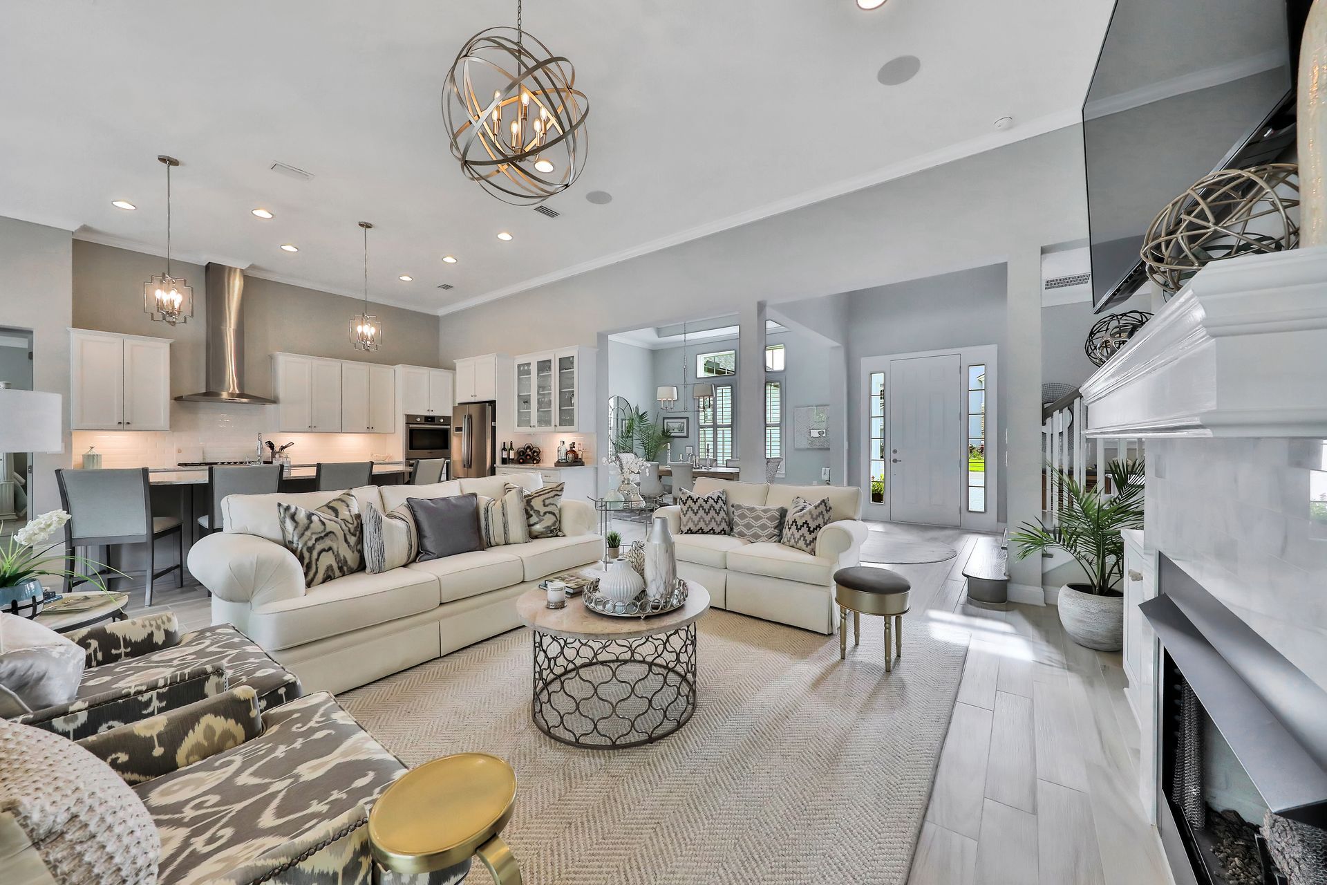A living room filled with furniture and a fireplace.