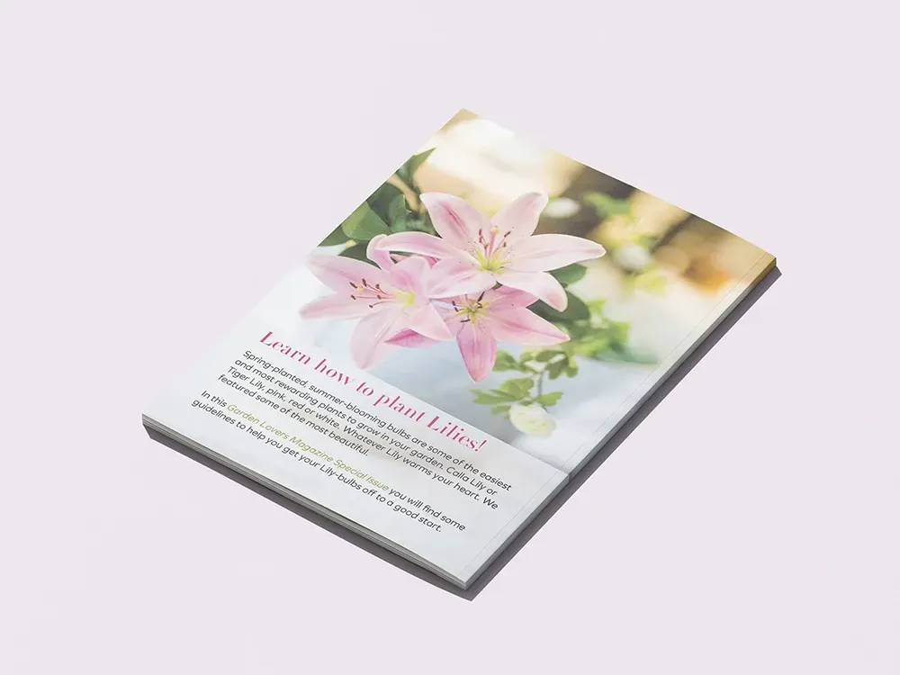 Floral books with pink lily covers on a light background