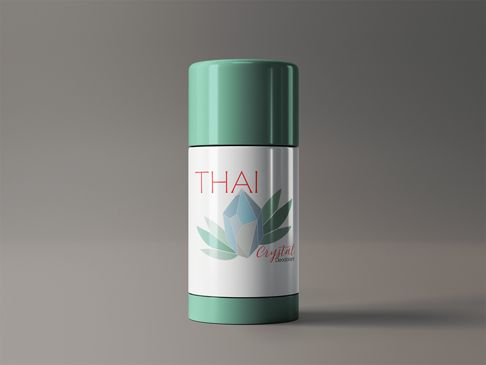 Mint-green Thai lotion bottle with a silver label on a gray background