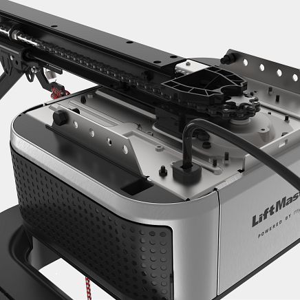 Close-up of a LiftMaster garage door opener with a black chain, silver housing, and black rail.
