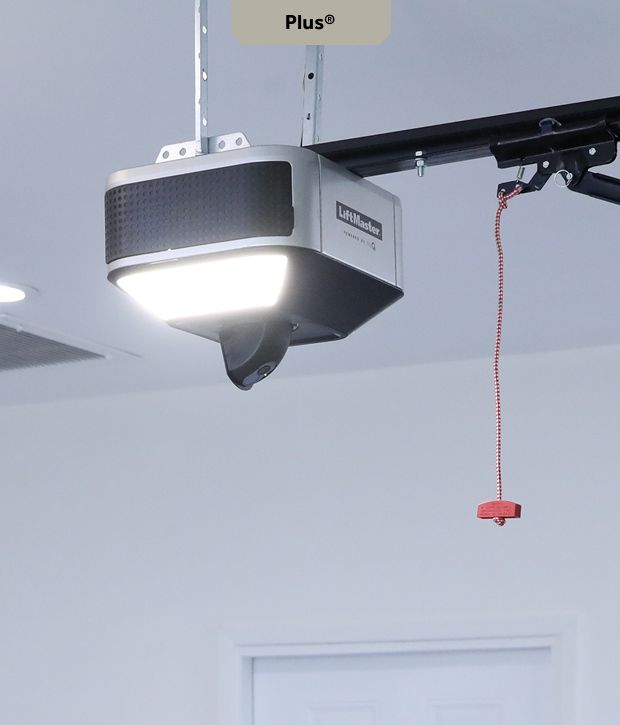Garage door opener with light and pull cord.