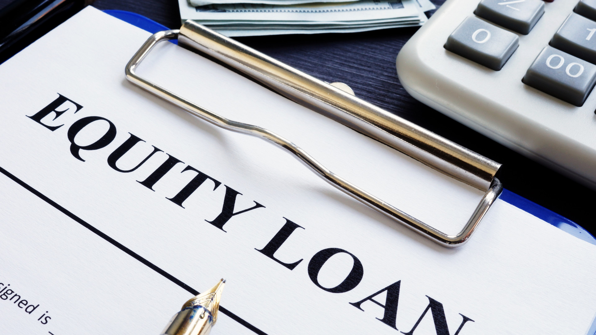 A clipboard with the word equity loan on it