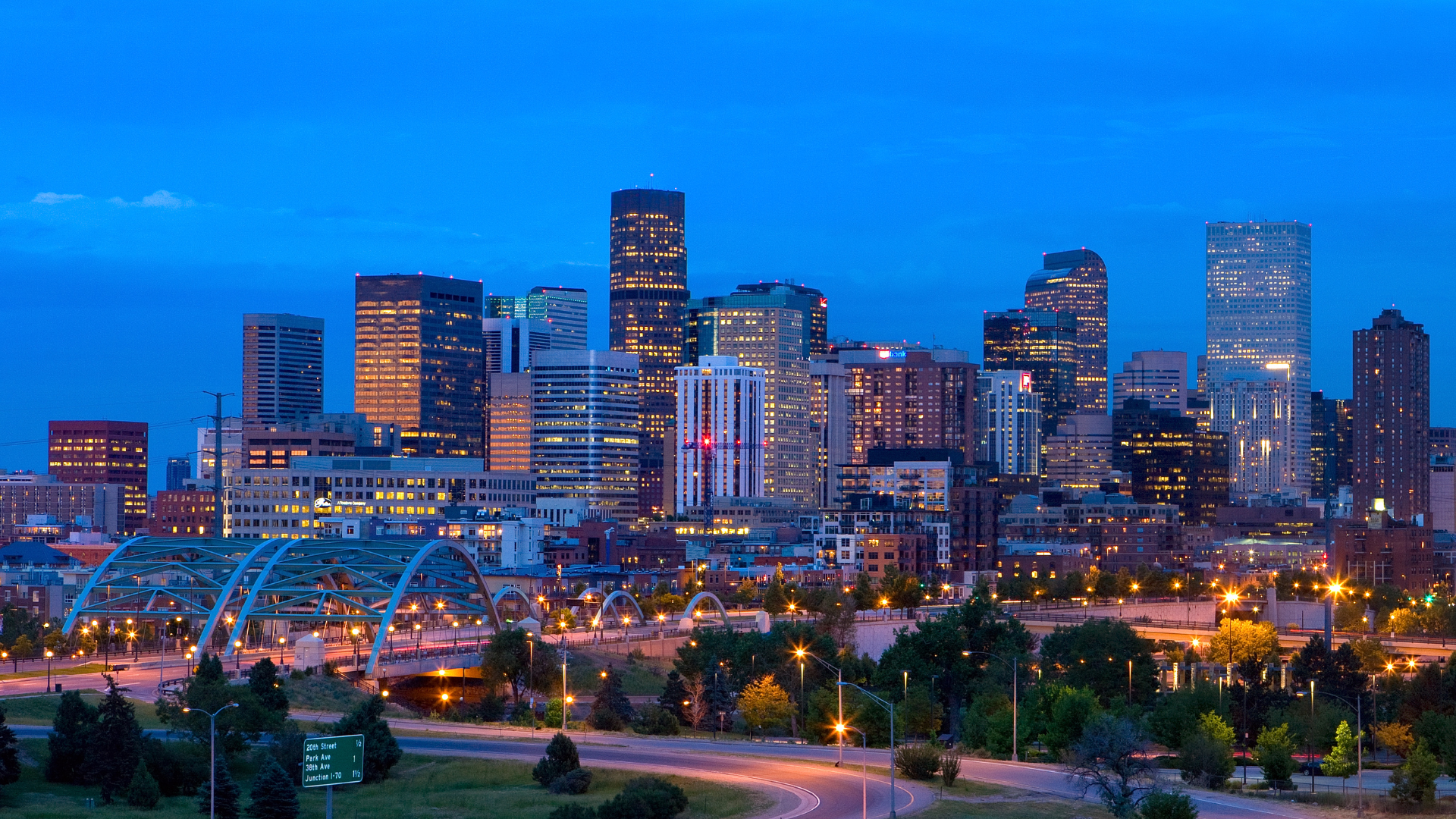 An aerial view of a city skyline at night.