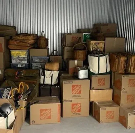 A bunch of home depot boxes are stacked on top of each other