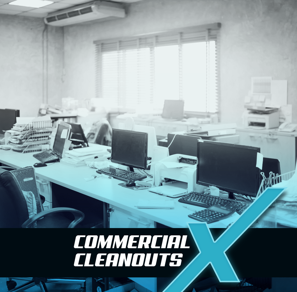 a black and white photo of desktop in office with commercial cleanouts text