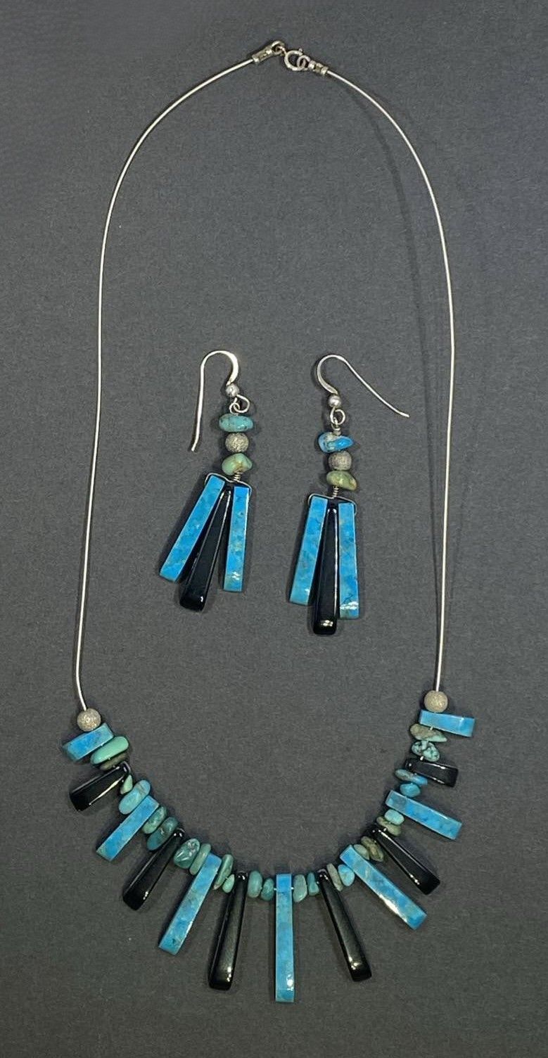 Turquoise and Black Stone Tapered gem stone necklace. Turquoise and Black Stone Tapered gem stone necklace.