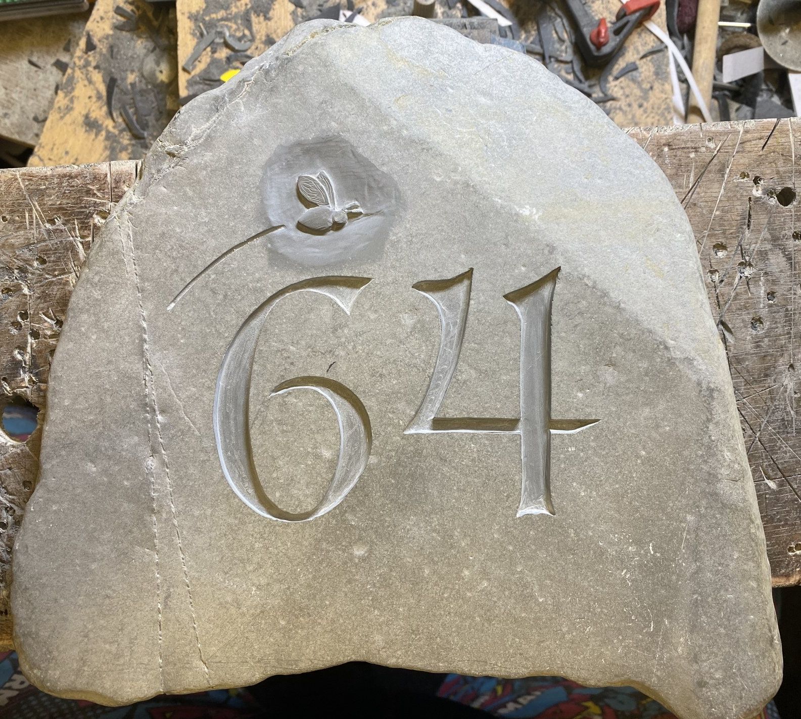 house number and bee