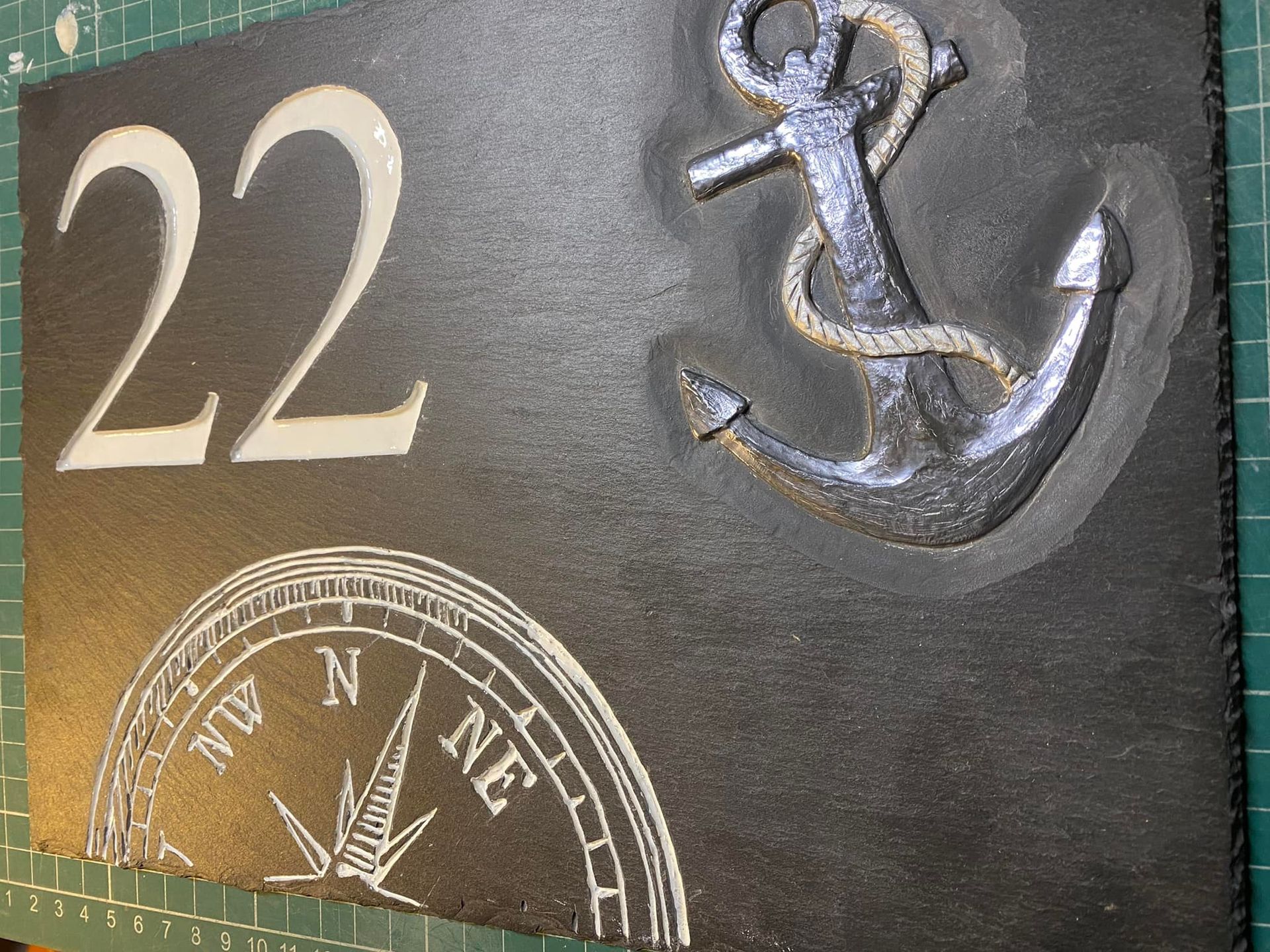 house number compass and anchor