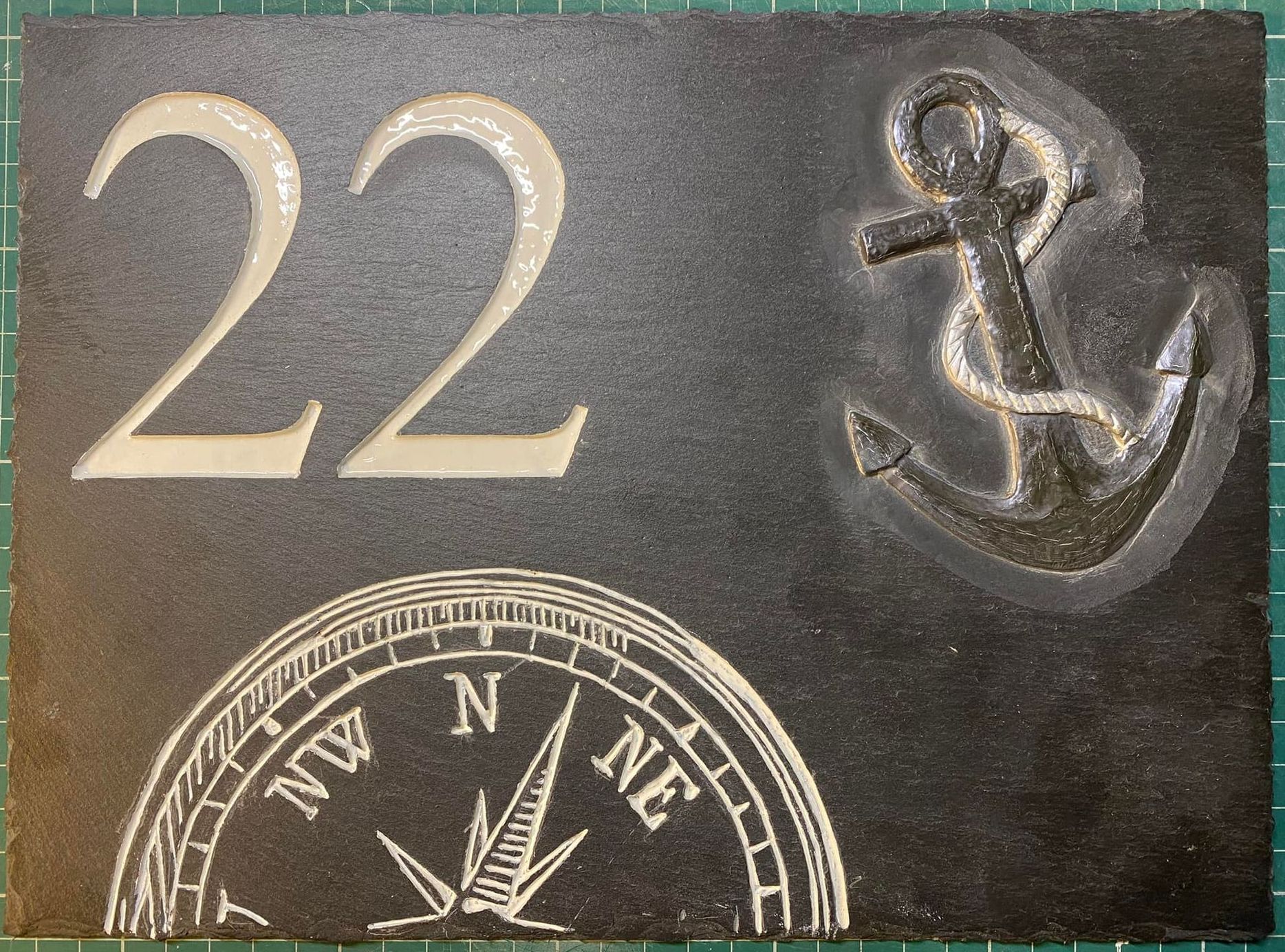 house number compass and anchor