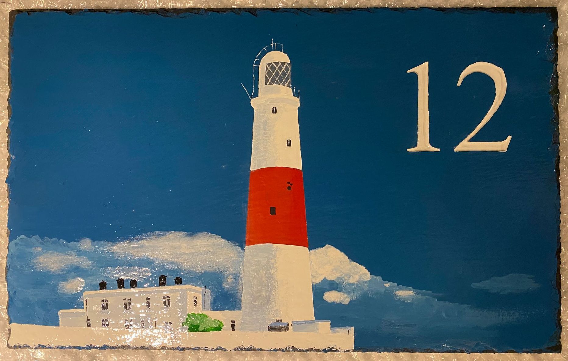 house number and lighthouse