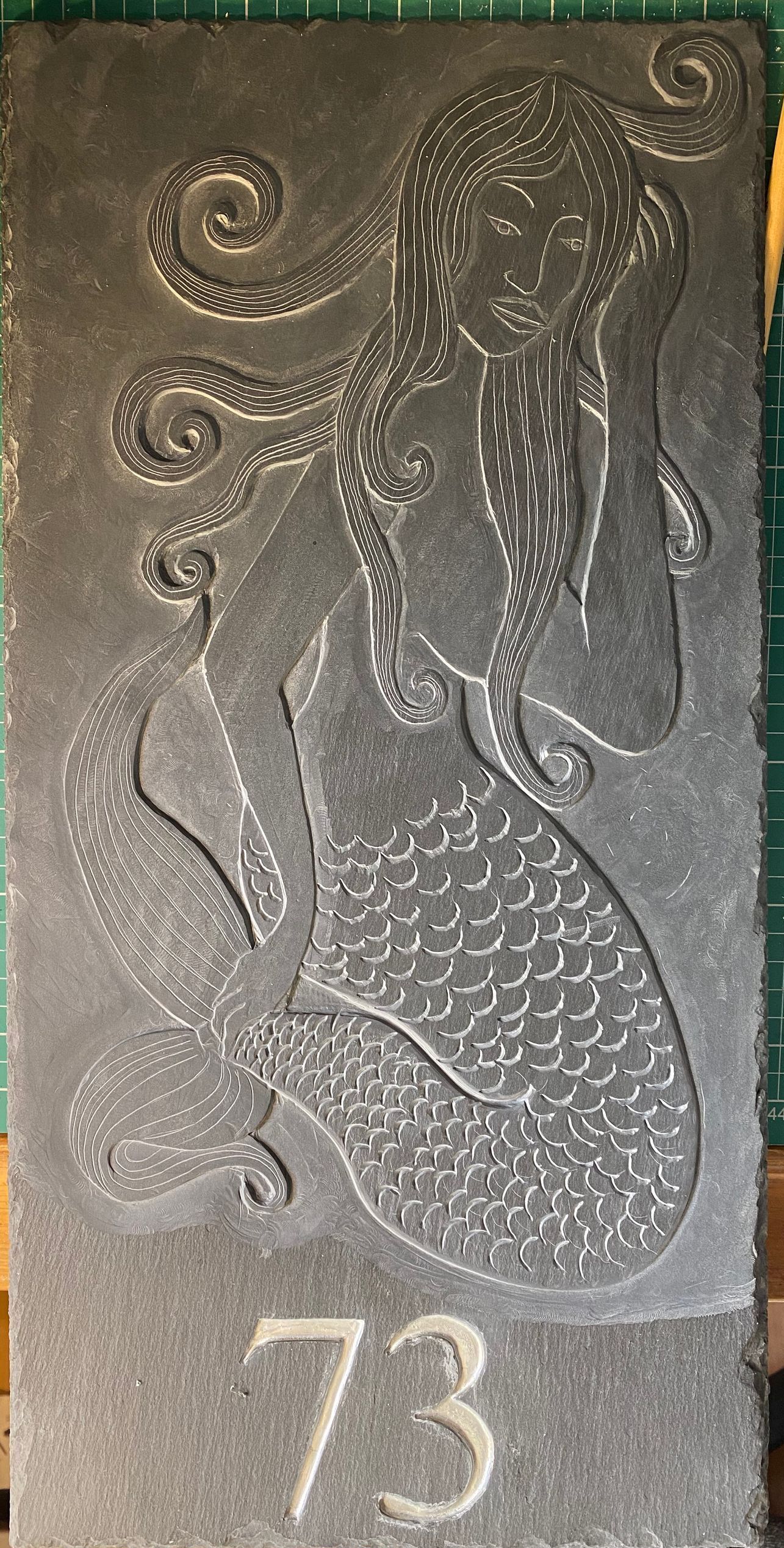mermaid in stone carved mermaid
