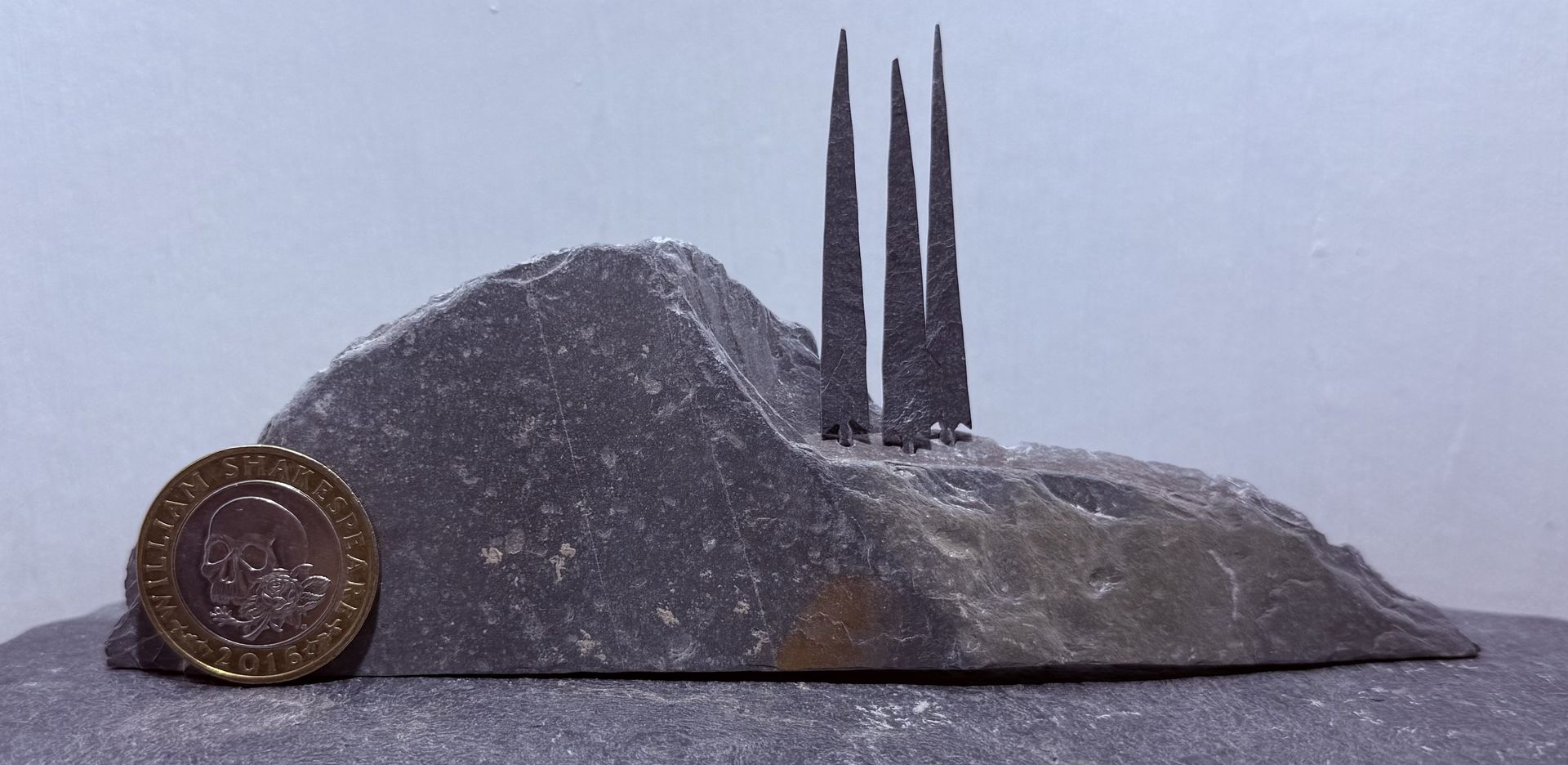 3 Tiny Tall Trees on a Hill with £2 coin for scale 3 Tiny Tall Trees on a Hill