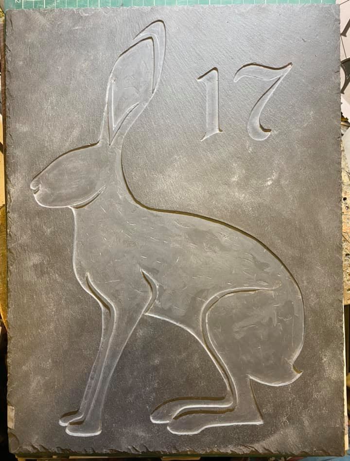 hare in slate house sign