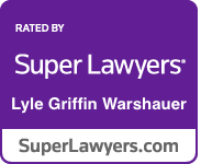 A purple badge that says `` super lawyers '' on it.