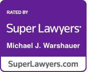 A purple badge that says `` super lawyers '' on it.