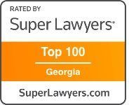 A badge that says `` rated by super lawyers top 100 georgia ''.