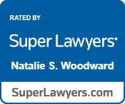 The logo for super lawyers natalie s. woodward is blue and white.