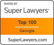 A badge that says `` rated by super lawyers top 100 georgia ''.