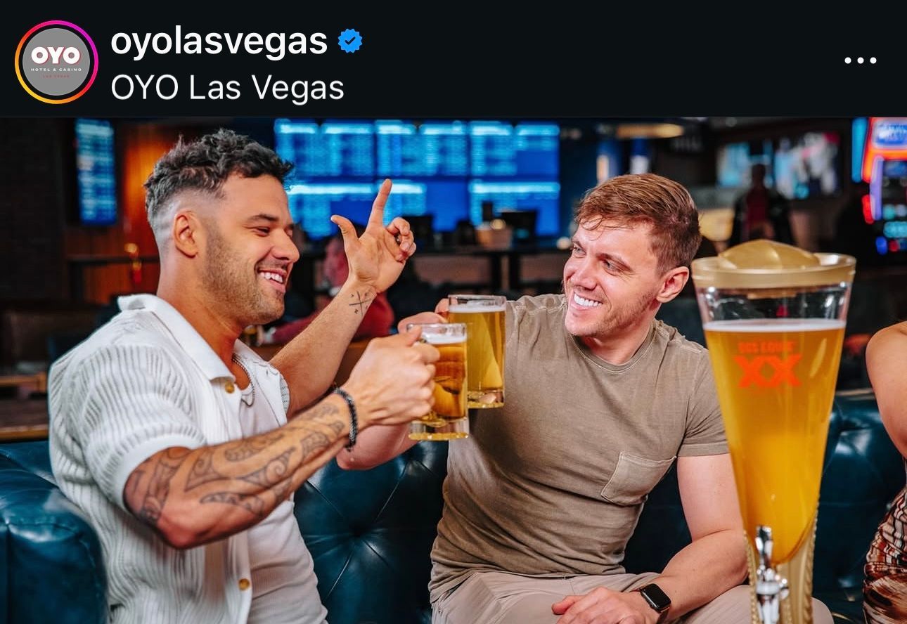Male lifestyle models posing for promotional content shoot at OYO Las Vegas Resort.
