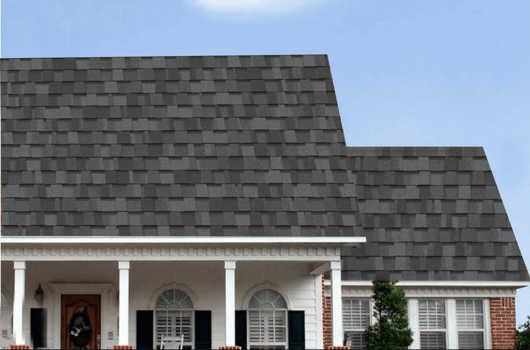 Best Ashalt shingles Zephyrhills. A photo of a house with Max Def Pewter shingles