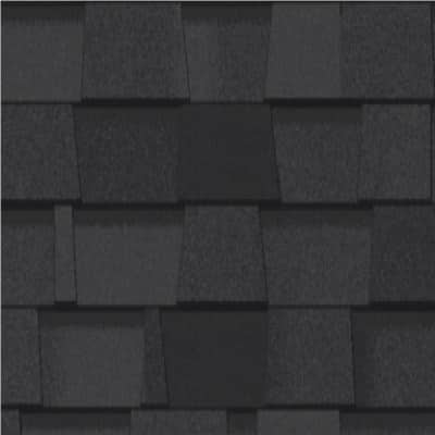 A close up of a black shingle roof.