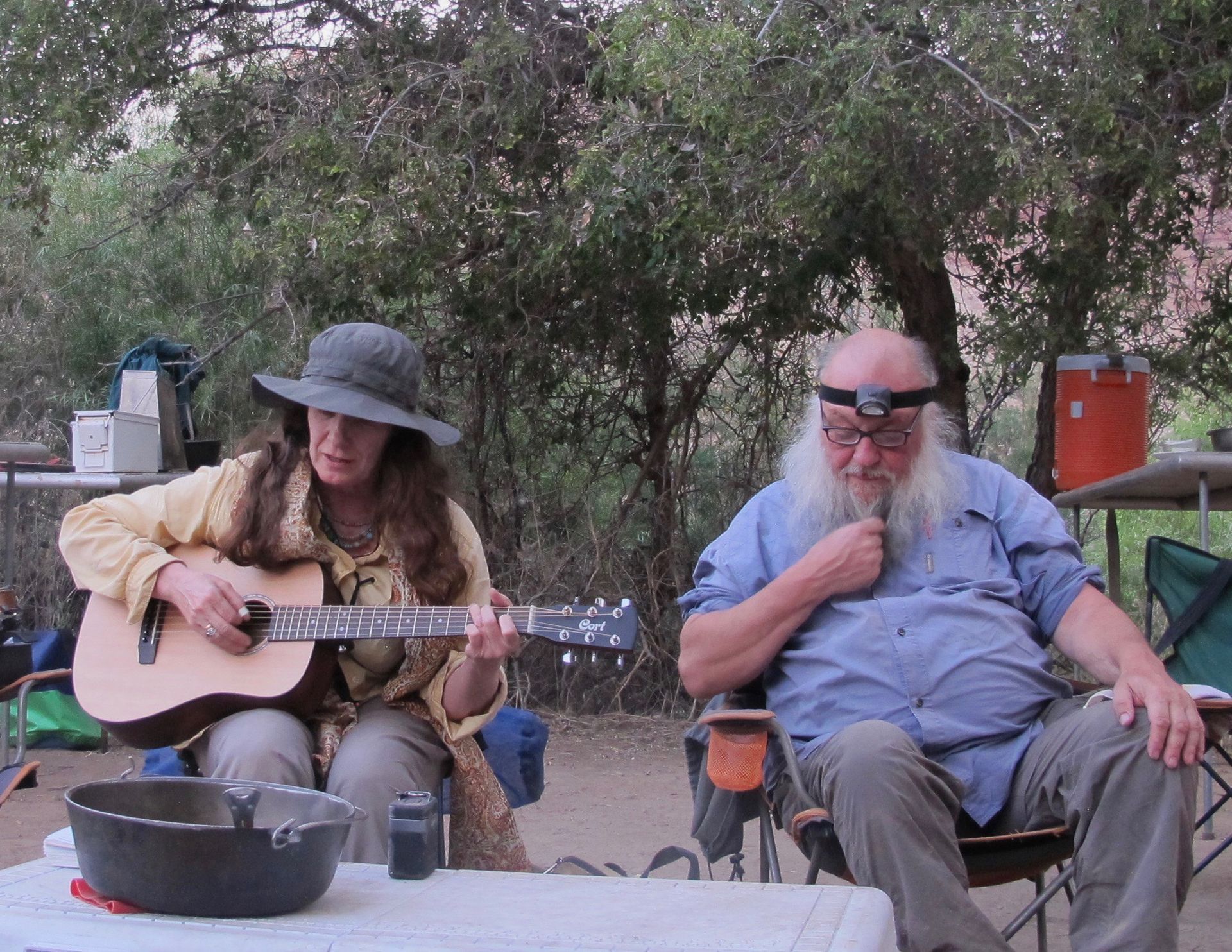 Ken Sander and Kate McCloud telling stories and singing songs on the Green River.