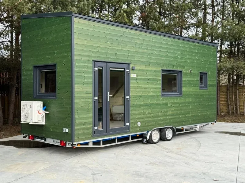 Tiny house Porto op trailer met groene gevelbekleding