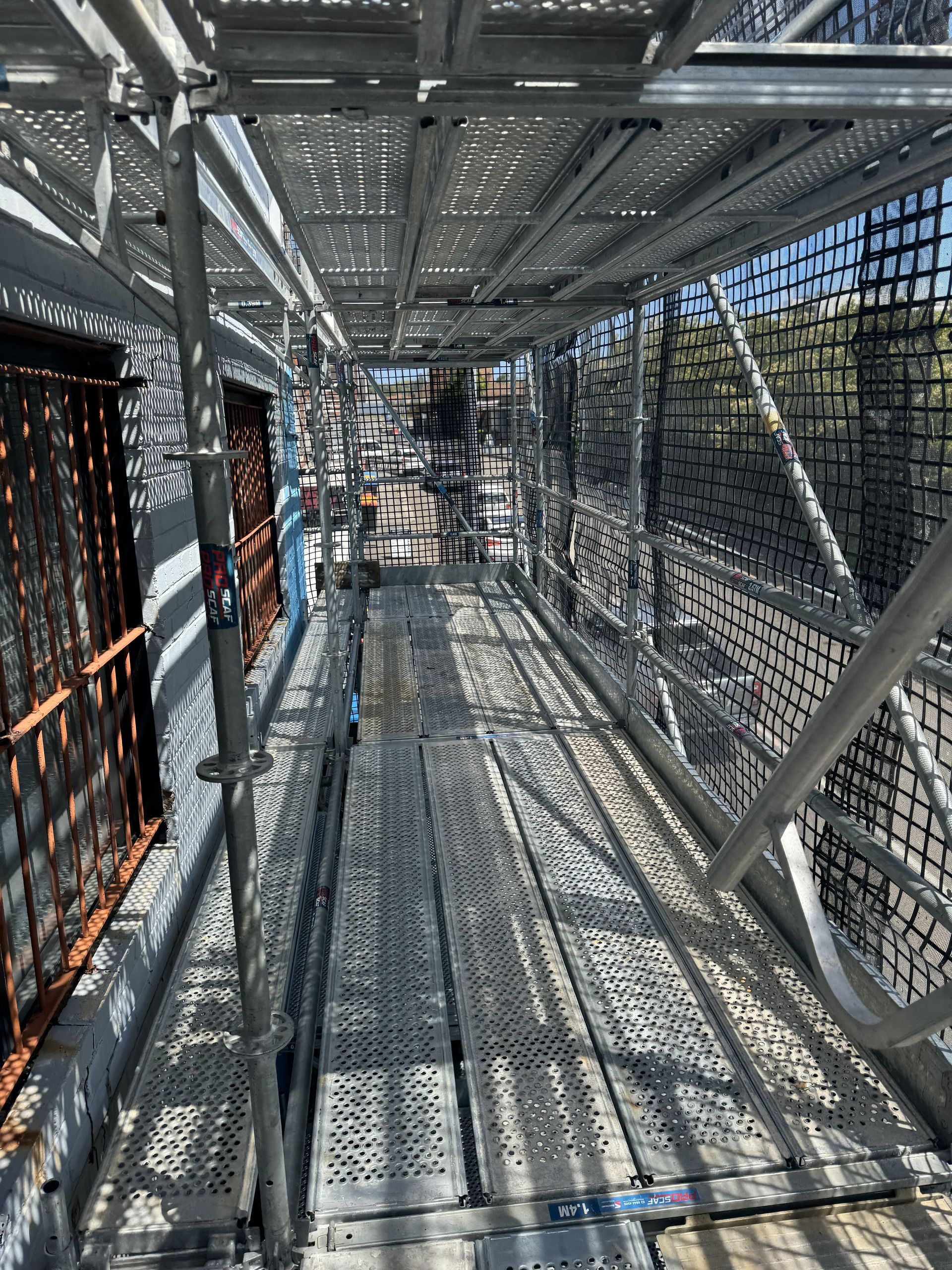 A scaffolding system is being used to build a bridge.