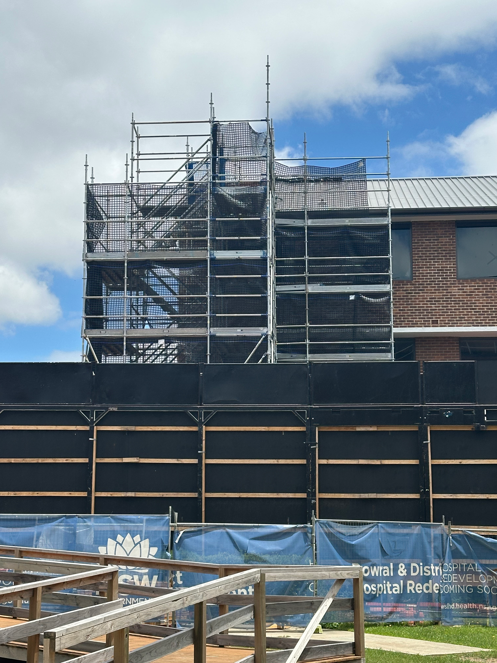 A house is being built with scaffolding around it.
