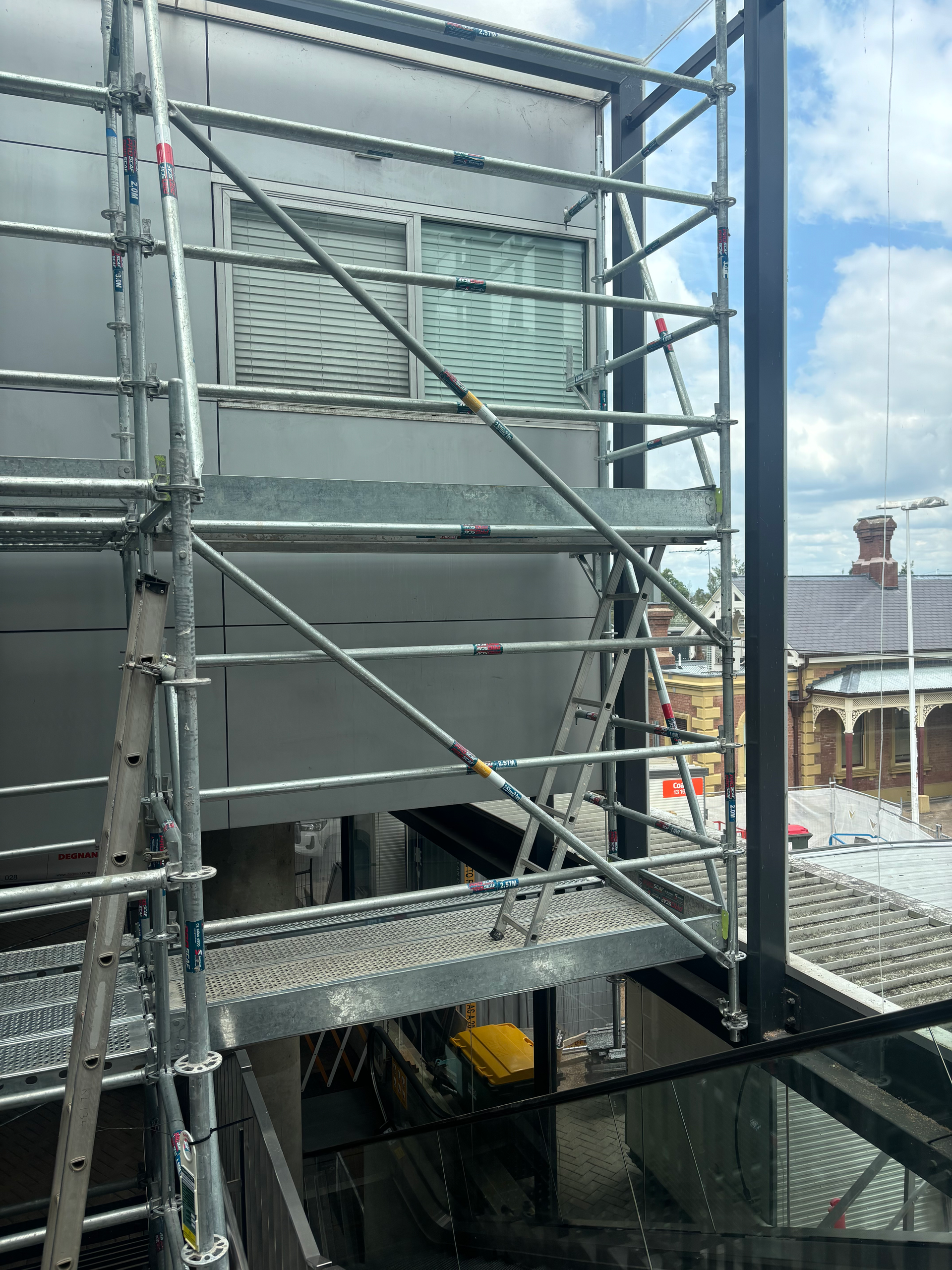 A building under construction with scaffolding around it