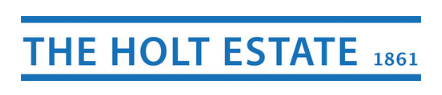 A blue and white sign that says the holt estate 1861