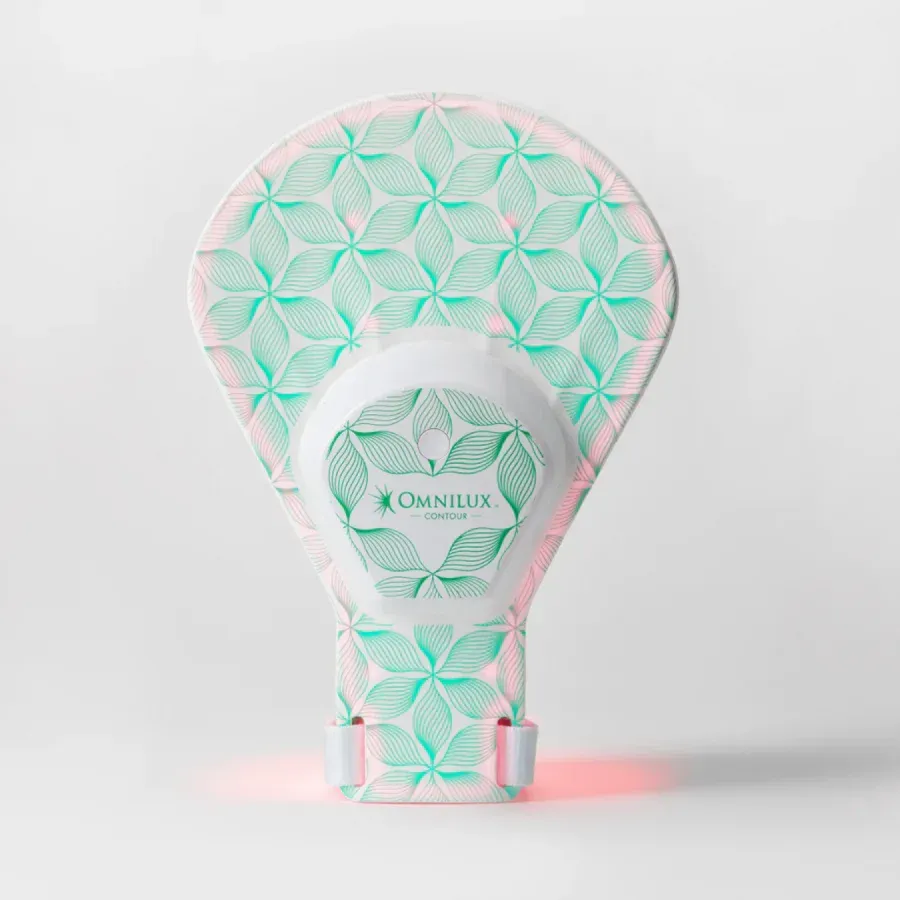 A light bulb with a pattern on it is sitting on a table.