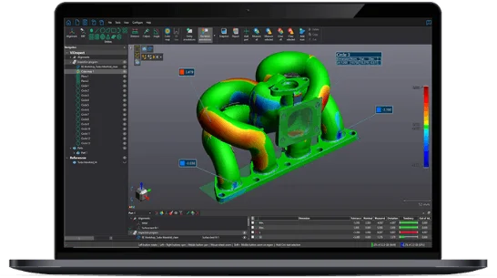 Laptop displaying 3D model of green and yellow object with data overlay.