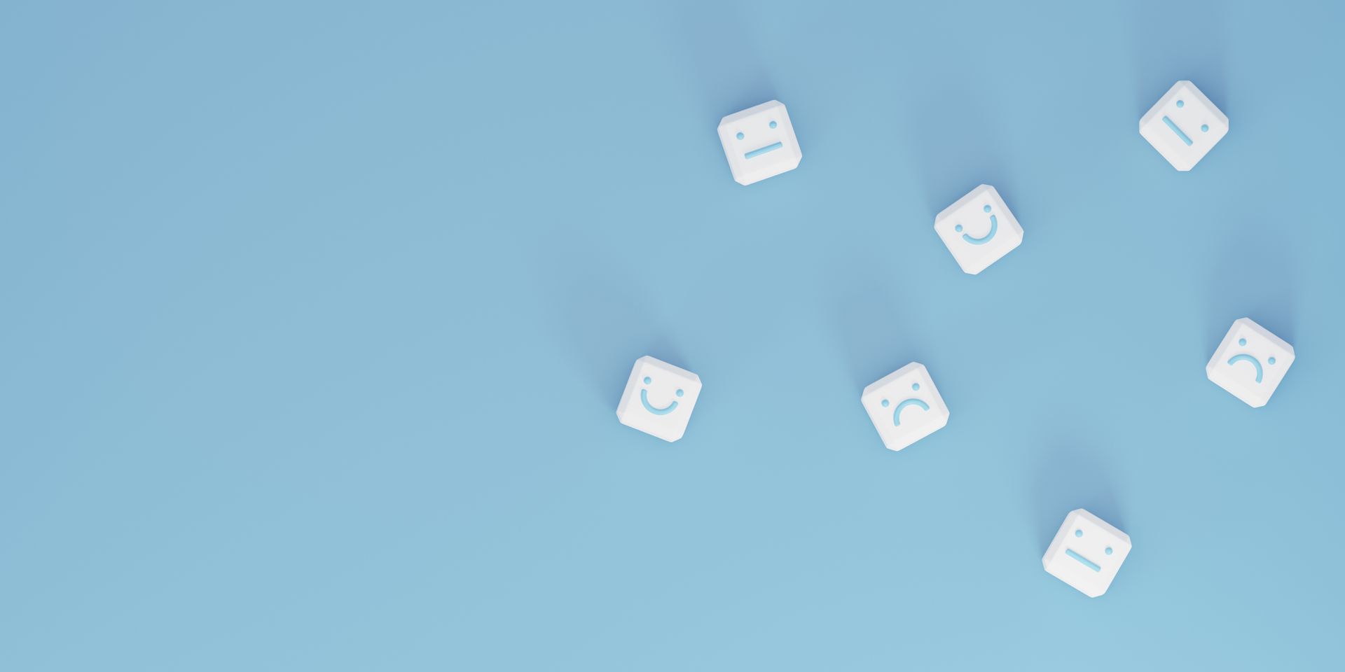 Cubes with happy and sad faces
