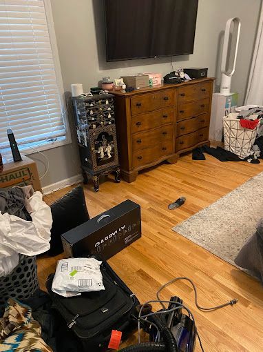 A living room filled with furniture and a flat screen tv.