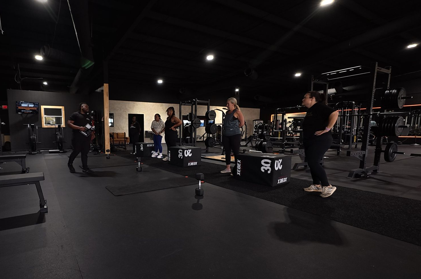Partner-based strength and conditioning class at Dynamis Athletics