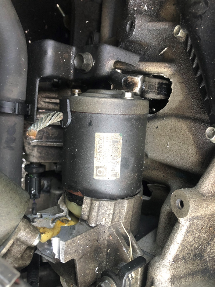 A close up of a part of a car engine