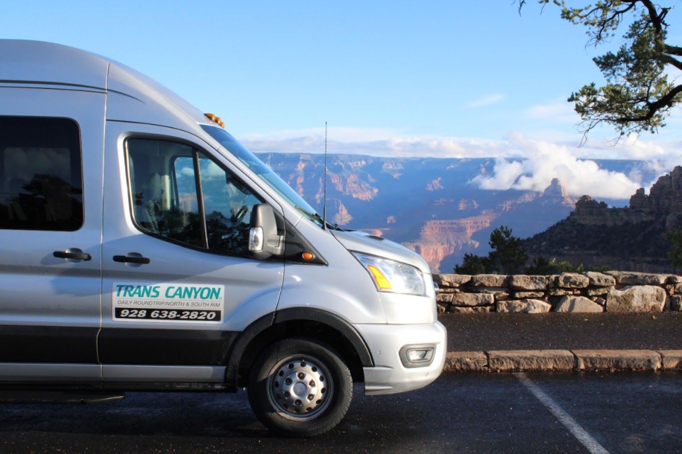 A white van with the word canyon on the side