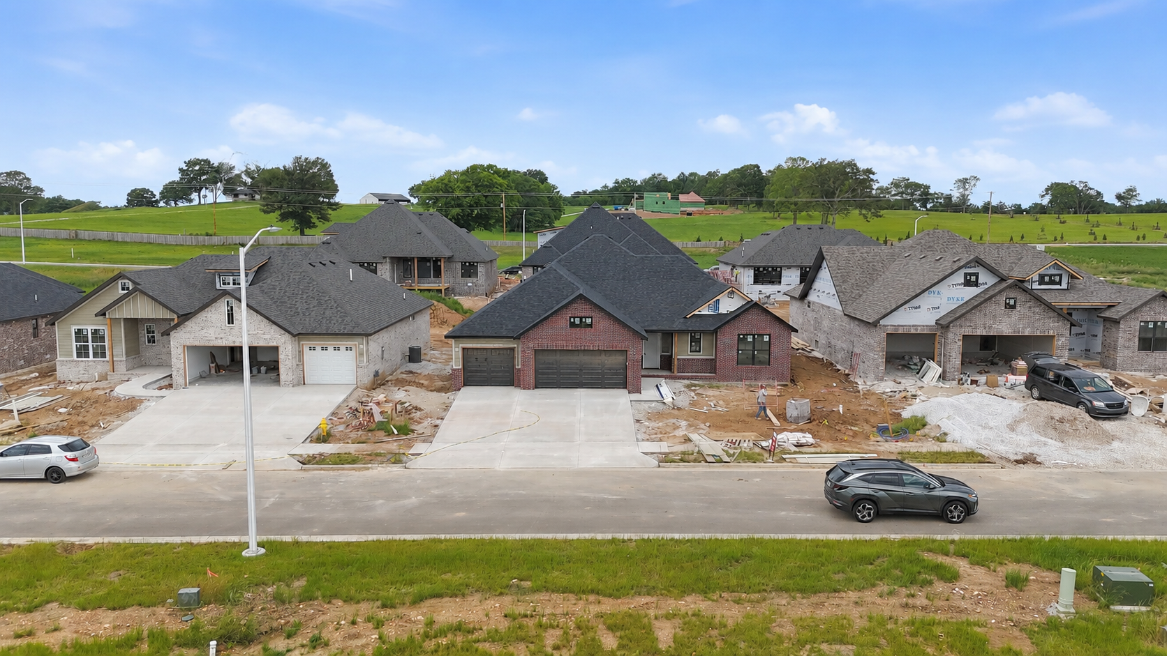 Newly built single-family homes along a residential street in Springfield, MO