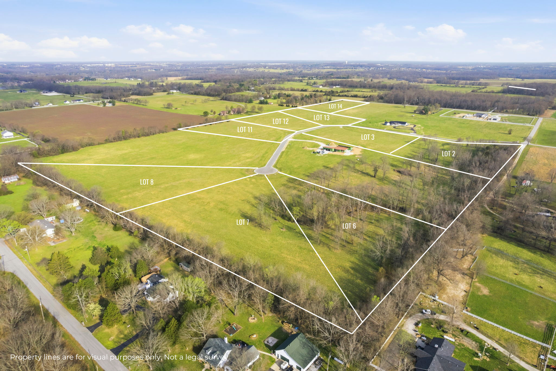 Flat land with white lines marking land parcels for sale in east springfield, missouri