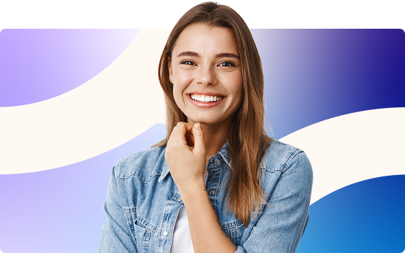 Smiling woman in a denim shirt against a purple and blue abstract background