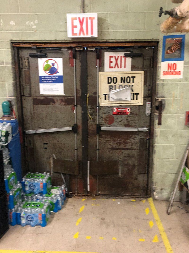 A door with a sign that says exit on it
