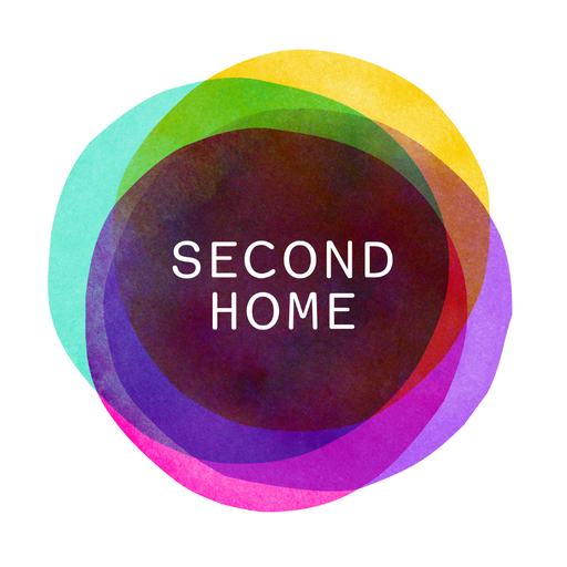 A colorful circle with the words second home on it