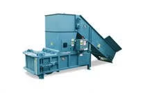 Blue industrial baler machine with angled conveyor belt on a white background