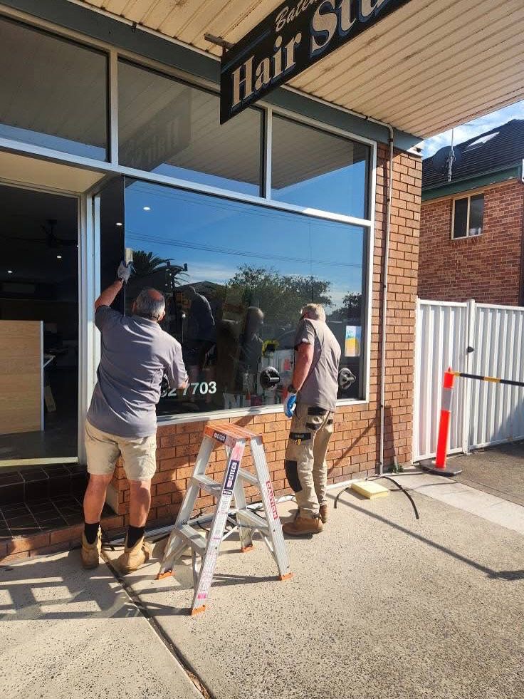 Glazier Installing Glazed Shopfront