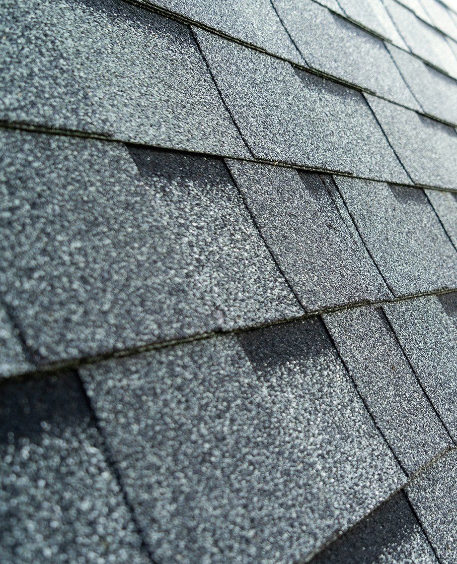 Technician Installing Metal Roofing Surface