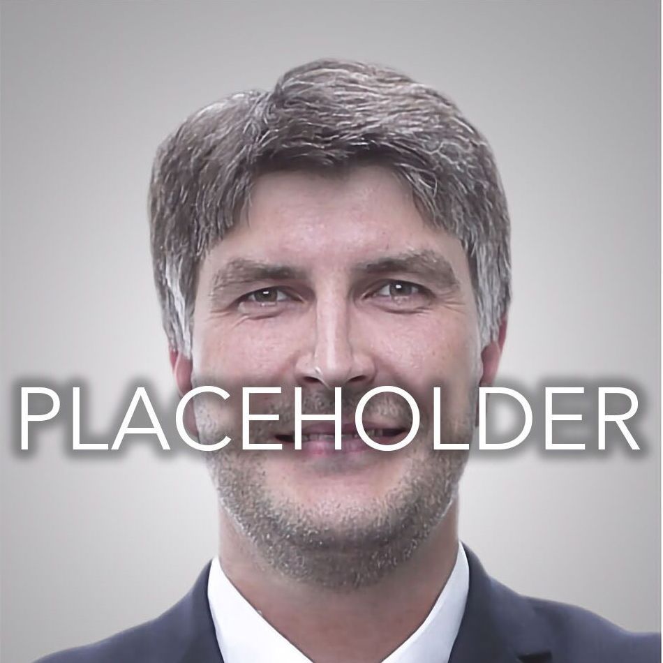 A man in a suit and tie with the word placeholder above him