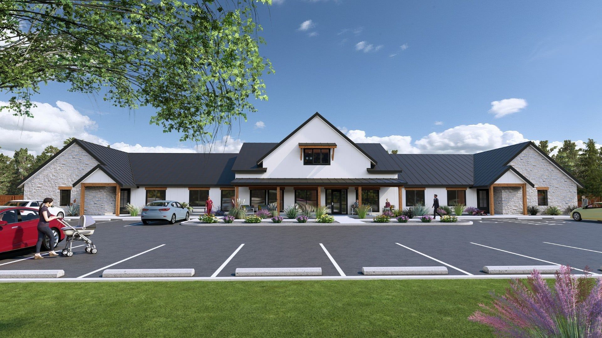 Harligen senior care building front, with white and stone facade, black roof, and empty parking lot under a blue sky