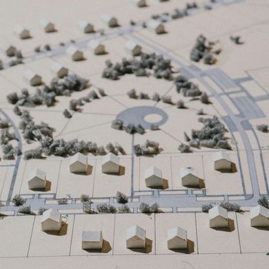 A model of a residential area with houses and trees