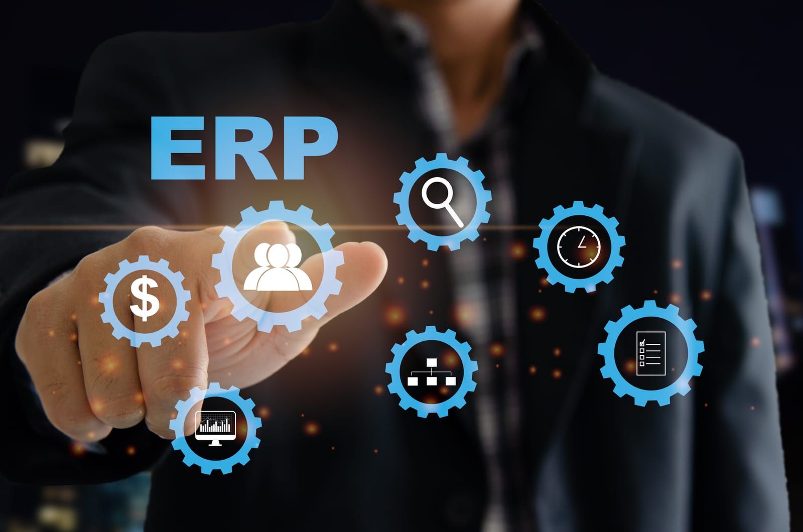 A man in a suit is pressing a button on a screen that says erp.